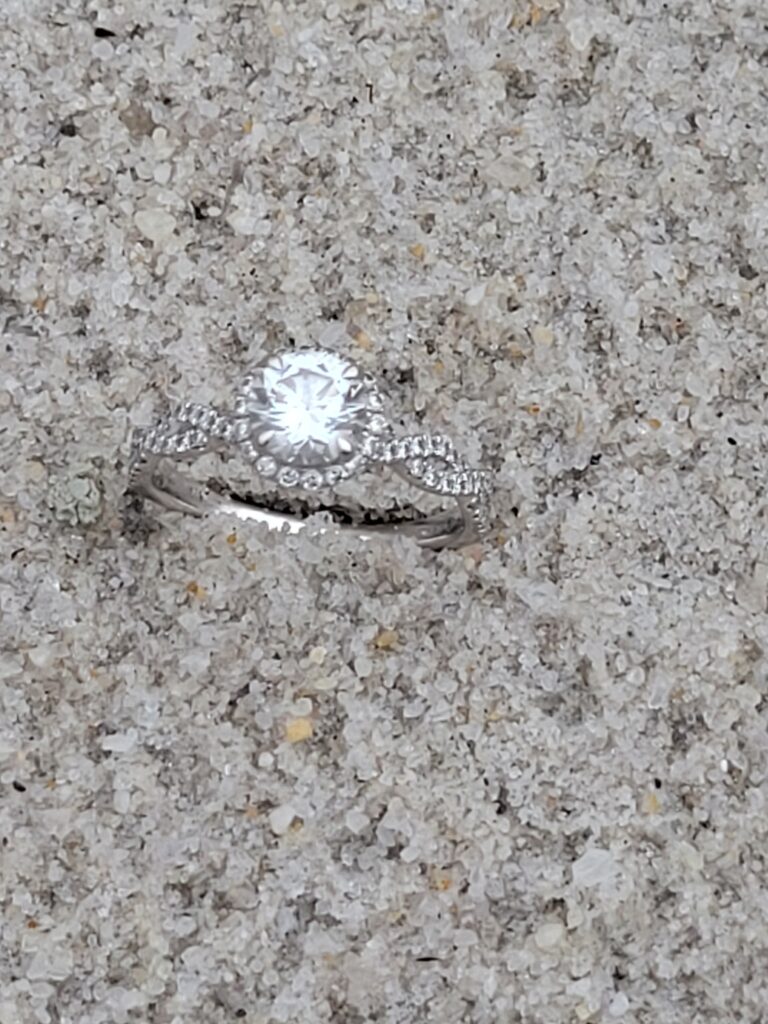 lost engagement ring found in the sand