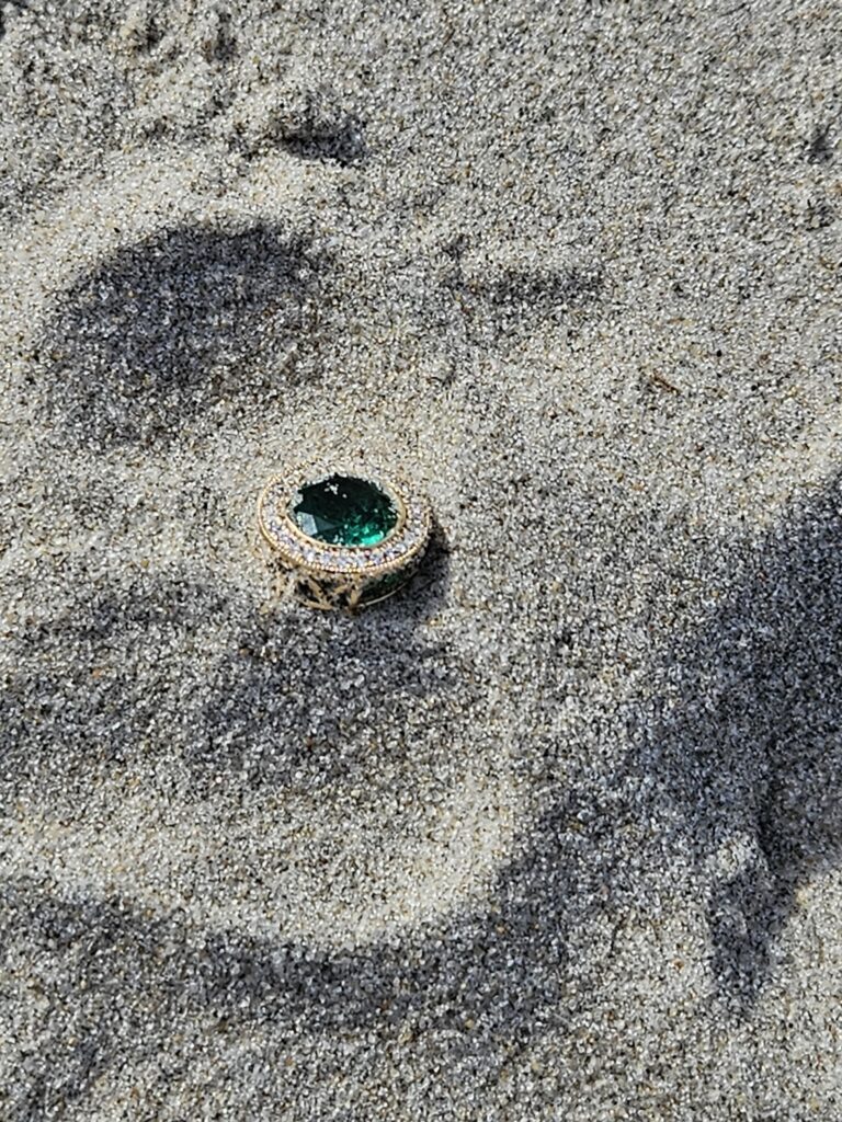 Avalon NJ gold pendant lost in sand found with metal detector