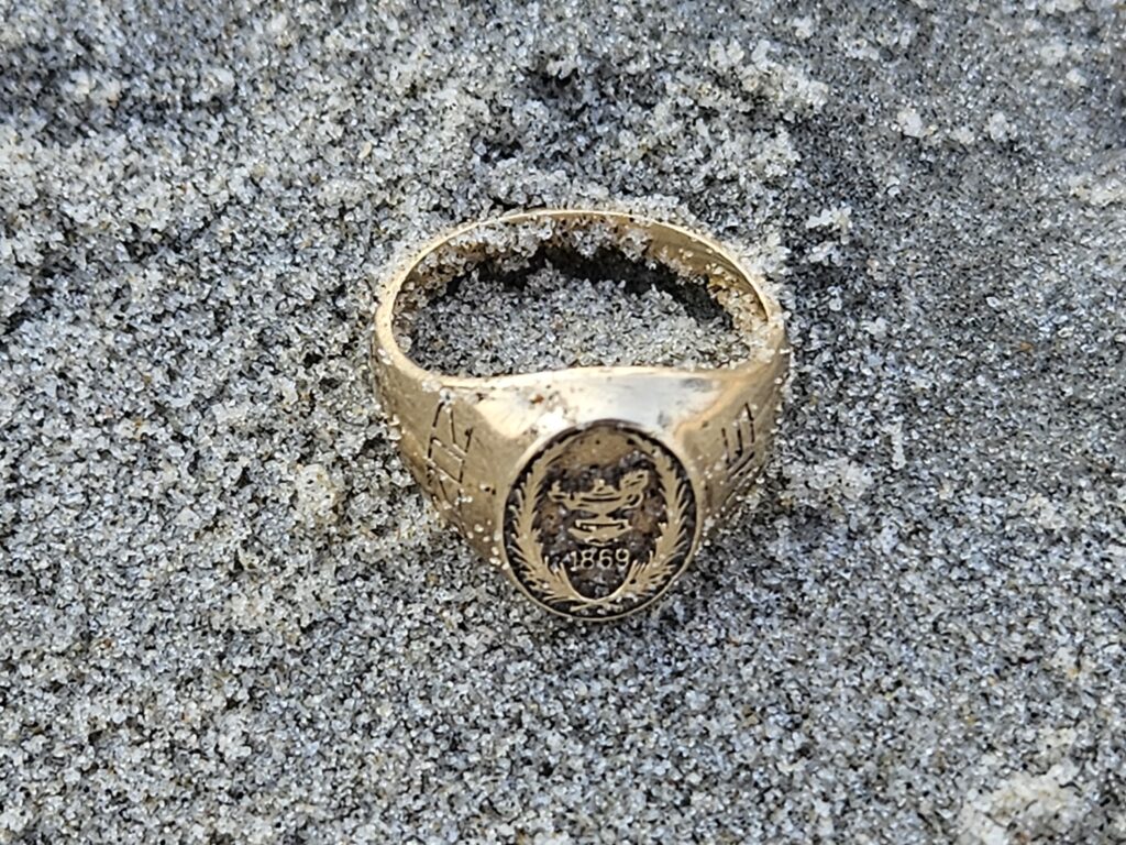 find my class ring in the sand