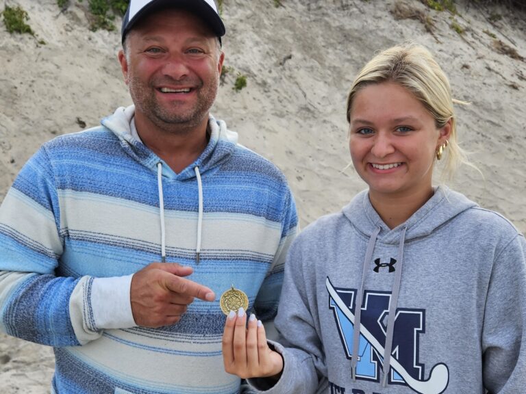 Sea Isle City Ring Finder with a metal detector